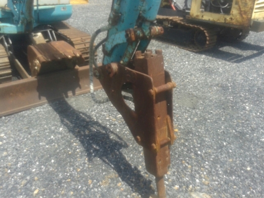 รถแบคโฮมีหัวเจาะ