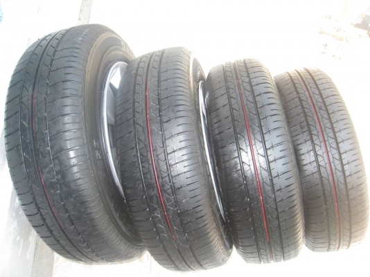 ขายกะทะล้อ nissan almera ขอบ14  4/100 +ฝาครอบ + ยางธันวาคมปี12 (081-3747940)