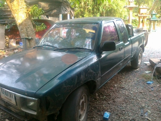 กะให้ช่างทำสีแต่ช่างไม่ว่างอะไหล่ก็ซื้อมาครบแล้ว 1.แก้มซ้ายขวา2.ขอบกระบะด้านซ้าย3.ฝาท้าย 4.กันชนหน้า ผมซื้อให้ครบแล้วใครมีอู่ที่ว่างงานเอาไปเก็บเองจดทะเบียน ธันวาคม 2537โปร่งหลังแท้ๆกระจกไฟฟ้า