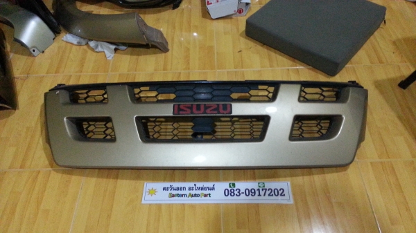 กระจังหน้าดีแม็ค โลโก้แดง ของแท้ถอดสีบรอนซ์ทอง