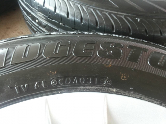 ล้อกะทะฝาครอบพร้อมยางเดิมบริสโตน DURAVIS 205/70ขอบ15 ปี15ถอดป้ายแดง