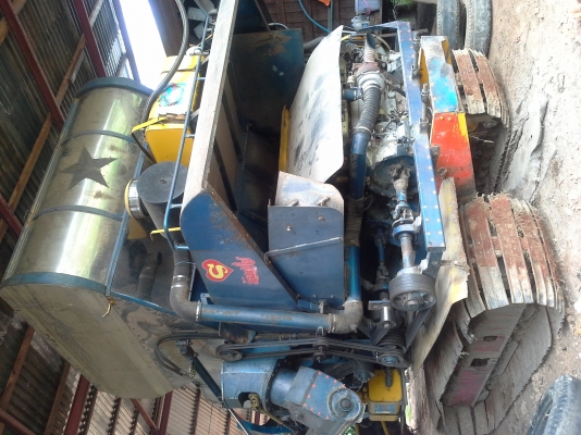 รถเกี่ยวเกษตรพัฒนา. รุ่น ปลดหนี้