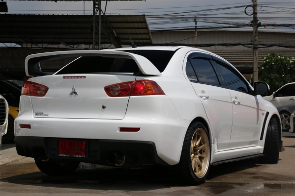 ขาย EVO X สีขาว ลิ้นแต่งรอบคันคาร์บอน ท่อคู่ สเตนเลททั้งเส้น