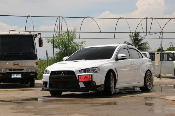 ขาย EVO X สีขาว ลิ้นแต่งรอบคันคาร์บอน ท่อคู่ สเตนเลททั้งเส้น