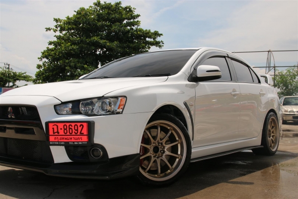 ขาย EVO X สีขาว ลิ้นแต่งรอบคันคาร์บอน ท่อคู่ สเตนเลททั้งเส้น