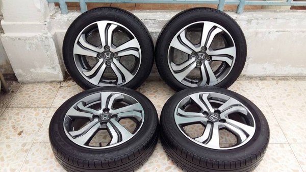 ขายล้อแม็ก new city 16" พร้อมยางปี14 สนใจติดต่อเล็กคลองสามครับ 081-3747940