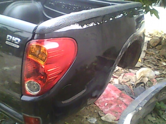 กะบะยกลงไทตัน