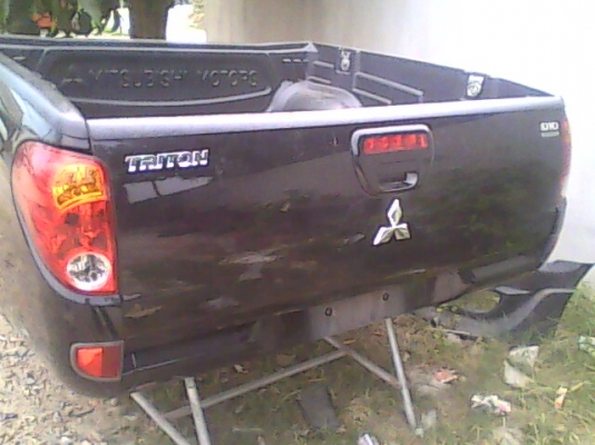 กะบะยกลงไทตัน