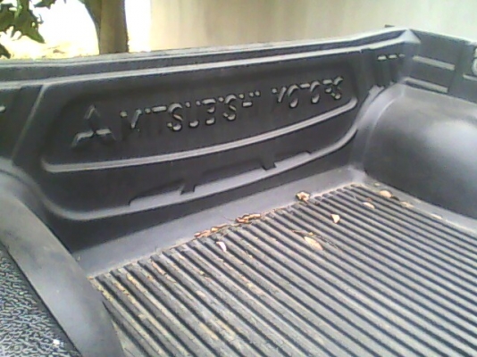 กะบะยกลงไทตัน