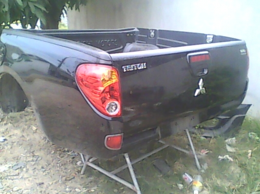 กะบะยกลงไทตัน