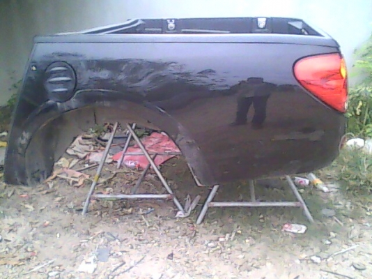 กะบะยกลงไทตัน