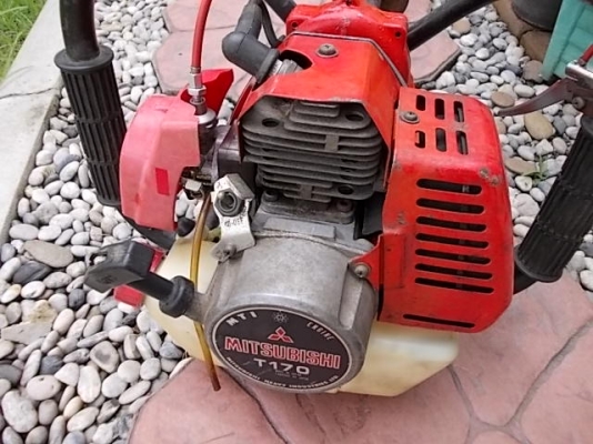 รหัส:12000721เครื่องเจาะดินเครื่องMitsubishi T170(3.0PS.)เหมาะใช้เจาะดินวางหลุมลึกยาว75cmwww.nihonmono.com