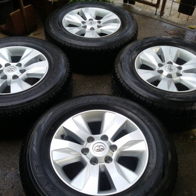 ล้อ REVO ขอบ 17 พร้อมยาง bridgestone 265 65 17 ชุดล่ะ 24500