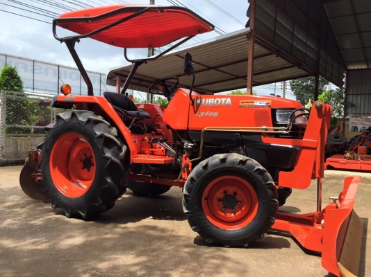 ขายรถไถKubota L3408 (4WD) พร้อมใบมีดหน้าใหม่และผานพรวนช้าง รถพร้อมใช้งาน