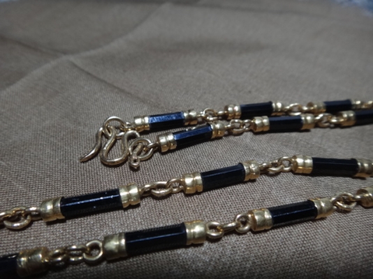 สร้อยทองคล้องพระประดับนิล29 เม็ด