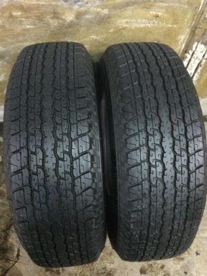 ยางถอดป้ายแดง 245-70-16 ปี15 1คู่