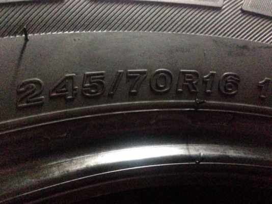 ยางถอดป้ายแดง 245-70-16 ปี15 1คู่