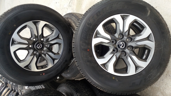 ล้อมาสด้าขอบ17 พร้อมยางป้ายแดงชุดละ 27500