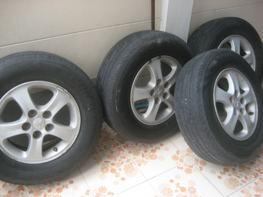 ยางพร้อมแมกด์ไตตันแท้ถูกๆๆขอบ15