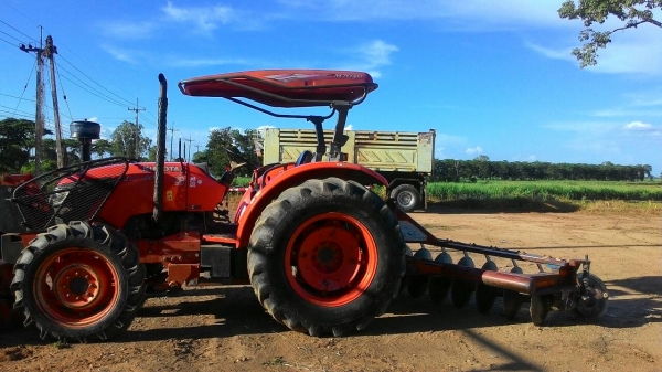 ขายรถไถ KUBOTA M 7040 สภาพดีเดิมๆพร้อมใช้งาน อุปกรณ์มีพร้อมหน้าและ หลัง