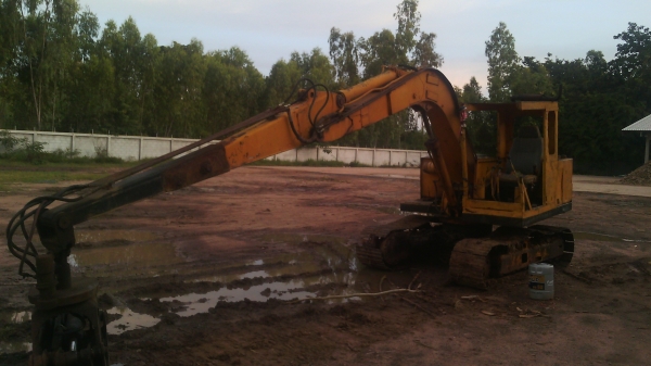 ขายรถแบ็คโฮ คีบไม้ ขายรถแบ็คโฮ คีบไม้