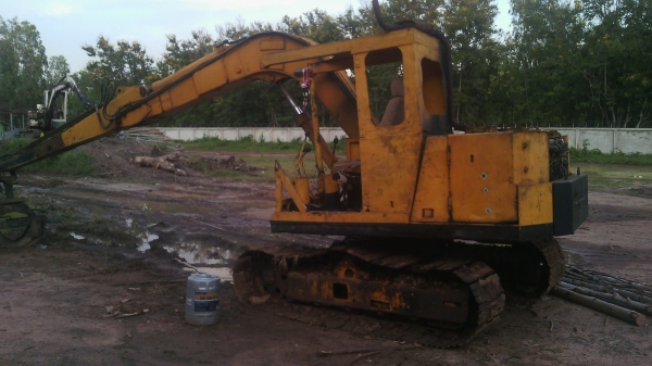 ขายรถแบ็คโฮ  คีบไม้