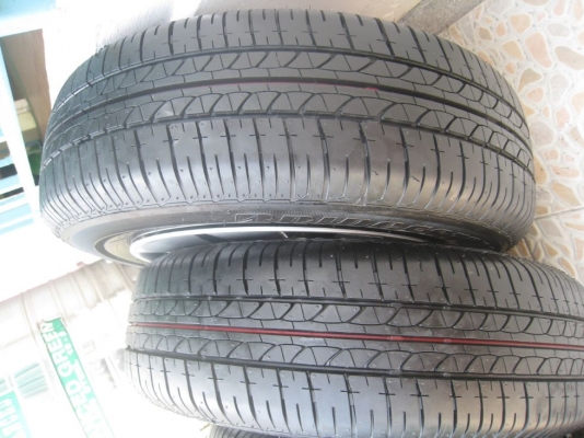 ขายกะทะล้อ nissan almera ขอบ14  4/100 +ฝาครอบ + ยางธันวาคมปี12 (081-3747940)