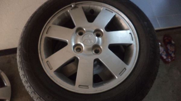 ขอขายแม็กซ์เดิมพร้อมยาง MITSUBISHI MIRAGEขอบ14นิ้ว   ยางบริดสโตน ปี 12