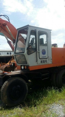 ขายรถแบคโฮ ล้อยาง HITACHI WH051เก่านอก พร้อมใช้งาน เอกสารอินวอยซ์