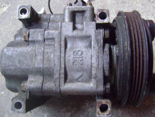 คอมแอร์ mazda 323 ไฟป็อบอัพ