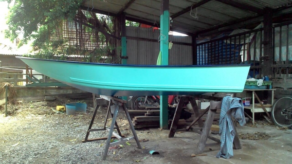 ขายเรือไม้ ท้องเรือหุ้มไฟเบอร์ยาว 11 ฟุตพร้อมเครื่อง TOHATSU 5 แรง