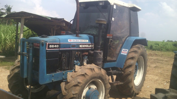 ขายรถไถ FORD รุ่น 6640 คานหน้าคาราโร่ เกีนร์  12x12 ตู้แอร์ เอกสาร อินวอย