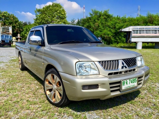 STRADA GRANDIS สตาด้าแค็ป เครื่อง 2500 GL ปี 2005 พร้อมเครื่องชุดใหญ่ ดอก 12 นิ้ว มีจอ เครื่องเล่น  แม็กขอบ 17  ยางใหม่ พวงมาลัยเพาเวอร์  วิ่งแสนกว่าโล  เครื่องดี ขับดี