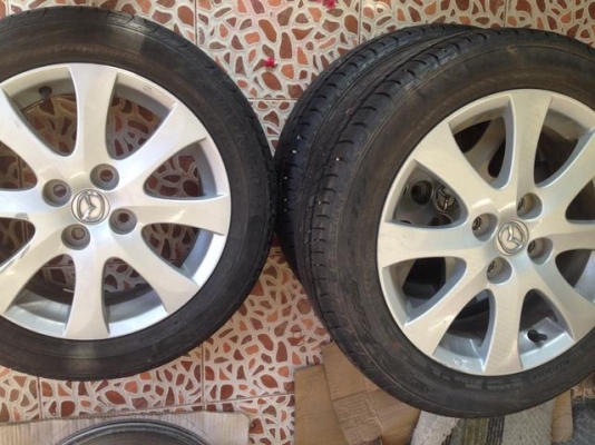 ขายล้อแม็กเดิม มาสด้า2 15 พร้อมยาง 185 55 15 ปี 13