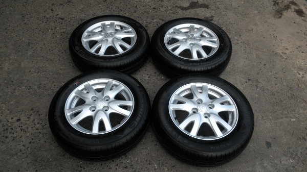 ล้อbrio ขอบ14  4รู100 พร้อมยางถอดป้ายแดงครับ