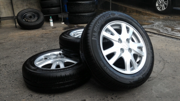 ล้อbrio ขอบ14  4รู100 พร้อมยางถอดป้ายแดงครับ