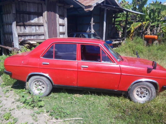 ขาย Datsan 120Y เครื่องดี ทีเดียวติด สีสวยพอได้แดงประกายเพชร แต่งแบบบ้านๆถูกๆ มีเล่ม ไม่มีชุดโอน