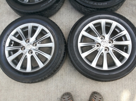 ล้อแม็กสีรมดำแท้ vios 12ก้าน ใส่ yaris colola ได้ ทุกรุ่น ใส่แล้วสวยมาก ล้อสวยทุกวง  ยางบริสโตน 185 60 15