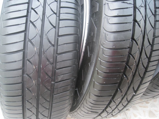 ขายกะทะล้อ nissan march 14" 4/100 (ชุดที่2) +ฝาครอบ+ยางปี12(081-3747940)