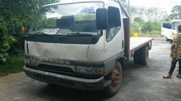 รถบรรทุก 6 ล้อ พื้นเรียบ  MITSUBISHI CANTER 115 แรงม้า  ปีจดทะเบียน 2547