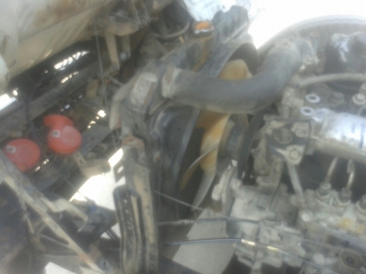 รถบรรทุก 6 ล้อ พื้นเรียบ  MITSUBISHI CANTER 115 แรงม้า  ปีจดทะเบียน 2547