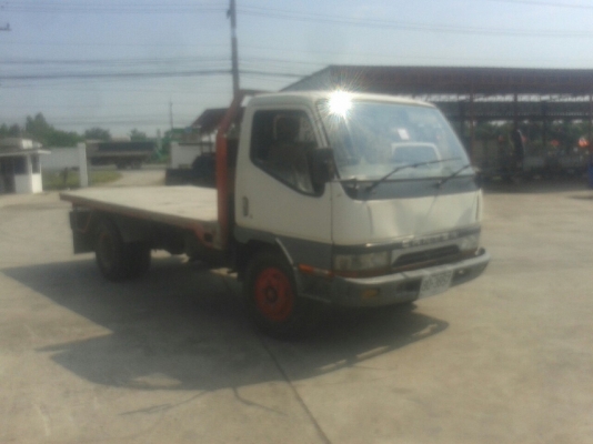 รถบรรทุก 6 ล้อ พื้นเรียบ  MITSUBISHI CANTER 115 แรงม้า  ปีจดทะเบียน 2547