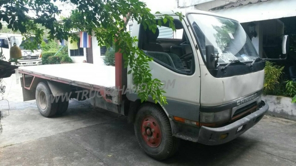 รถบรรทุก 6 ล้อ พื้นเรียบ  MITSUBISHI CANTER 115 แรงม้า  ปีจดทะเบียน 2547