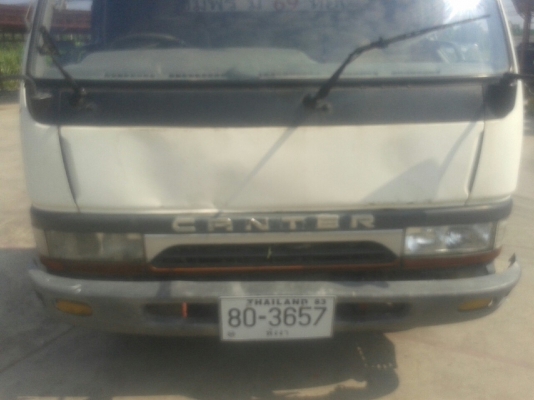 รถบรรทุก 6 ล้อ พื้นเรียบ  MITSUBISHI CANTER 115 แรงม้า  ปีจดทะเบียน 2547