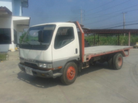 รถบรรทุก 6 ล้อ พื้นเรียบ  MITSUBISHI CANTER 115 แรงม้า  ปีจดทะเบียน 2547