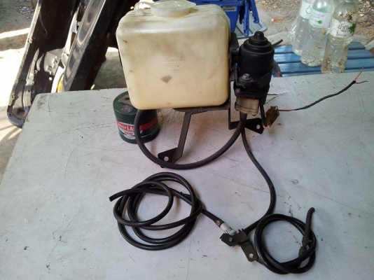 ชุดมอเตอร์ฉีดไฟหน้าพร้อมถังพักน้ำ Terrano I ชุดมอเตอร์ฉีดไฟหน้าพร้อมถังพักน้ำ Terrano I