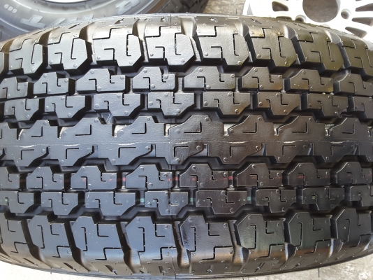 ยาง bridgestone 245 70 16 ปี 15 ถอดป้ายแดงชุดล่ะ 15000