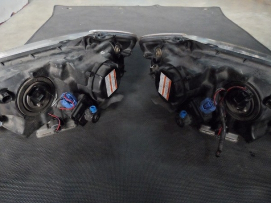 ขาย ไฟหน้ารถยนต์ ซีนอล มาสด้า 323 โปทีเจ้ Mazda 323 Protege xenon ของแท้นำเข้าจากญี่ปุ่น