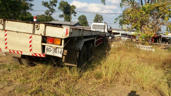 ขายรถบรรทุก 14 ล้อหัวลาก หัวลากนิสสัน คัส J เครื่อง 185 แรงม้า หางพื้นเรียบสามมิตร 2 เพลายาว 12 เมตร ราคา 470000