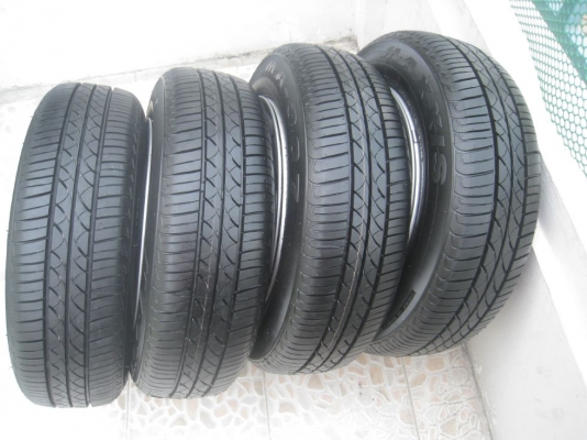 ขายกะทะล้อ nissan march 14" 4/100 (ชุดที่2) +ฝาครอบ+ยางปี12(081-3747940)